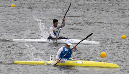 Barnaul, Russia - May 22, 2021: Athletes from Italy and Uruguay competing in K1 M event in 2021 ICF Canoe Sprint World Cup and Olympic Qualification.のeditorial素材