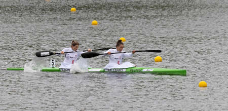 Barnaul, Russia - May 22, 2021: Athletes from Austria V. Schwarz and AR. Lehaci and competing in K2 W event in 2021 ICF Canoe Sprint World Cup and Olympic Qualification.のeditorial素材