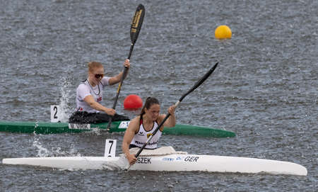 Barnaul, Russia - May 23, 2021: M. Virik from Norway and German athlete P. Paszek competing in K1 W event in 2021 ICF Canoe Sprint World Cup and Olympic Qualification.のeditorial素材