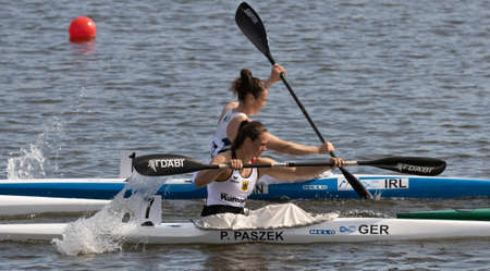 Barnaul, Russia - May 23, 2021: Irish J. Egan and German athlete P. Paszek competing in K1 W event in 2021 ICF Canoe Sprint World Cup and Olympic Qualification.のeditorial素材