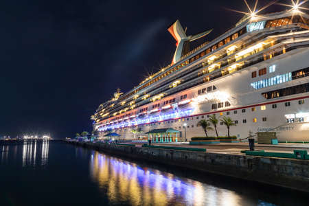 Nassau, Bahamas - June 16, 2019: Beautiful low angle shot of Carnival Liberty cruise ship docked at...