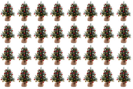 Christmas pine trees in pots wrapped in cloth and decorated with colorful balls, cones, red berries. Website background. Isolated, white background. Banner size. Seamless pattern.の写真素材