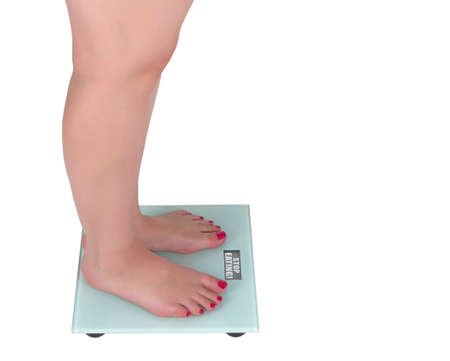 Digital scale stop eating, isolated on a white backgroundsの写真素材