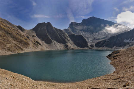 The fantastic valley of Greina and one of his lakes in Tessin, Switzerlandの写真素材