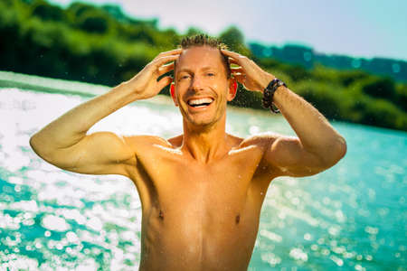 sexy young man happy  and having fun in the summerの写真素材