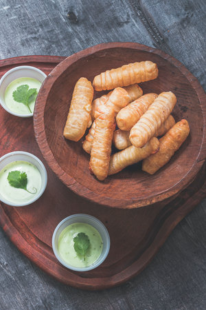 traditional cheese sticks from the venezuelan gastronomy called tequeÃ±osの写真素材