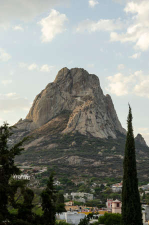 rocky mountain in the little town of PeÃ±a de Bernal in Mexico