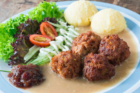 Meat balls with smashed potatoes