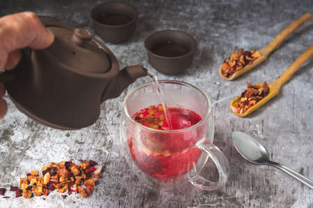 organic red berry tea in a glass mugの写真素材
