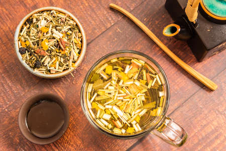 organic green tea on a wooden tableの写真素材