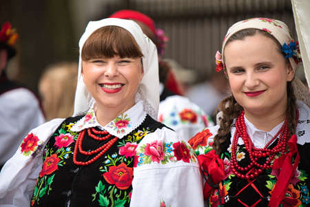 Lowicz, June 11, 2020: Portraits of women dressed in polish national folk costumes from Lowicz...
