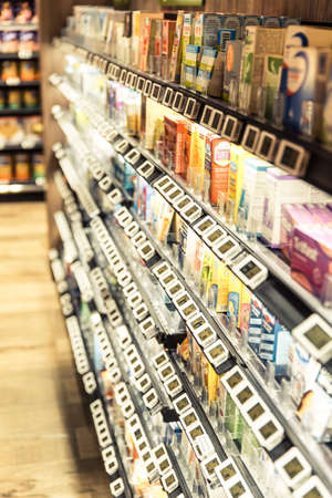 Singapore, Nov 2019: Shelves at supermarket with digital displays for price tags. Electronic shelf label systemのeditorial素材