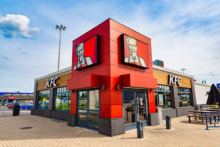 Warsaw, Poland, September 2020: KFC logo at the entrance to its restaurant.のeditorial素材