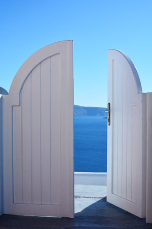 White wooden door on Satorini Island in Oia village, Greeceの写真素材