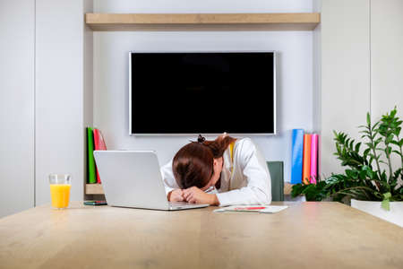 Young nutritionist woman working looking sideways with doubtful and skeptical expression....