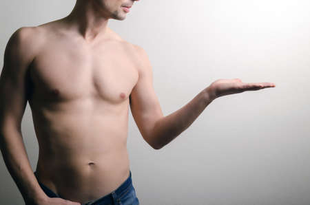 man feed on hand.の写真素材