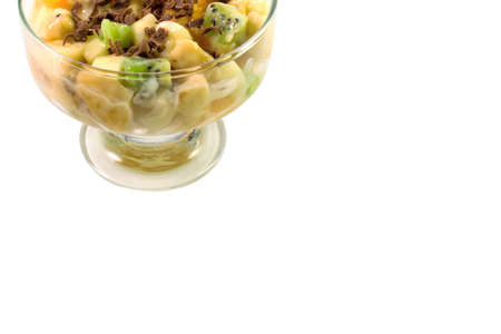 Vegetable salad mixed in a glass bowl on a white isolated background. Closeup.の写真素材