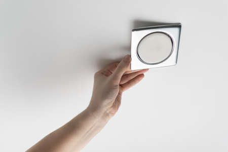 Handyman repair ceiling led light panel Ceiling light replacement Do it youself concept Energy...