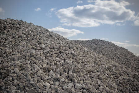 A commercial gravel pit of crushed stone for construction and road works. The concept of...