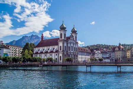 View of Jesuitenkirche and surroundings from the Chapel Bridge, Lucerne, Switzerlandの写真素材
