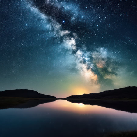 Milky Way over the lake with reflection in the water at nightの素材