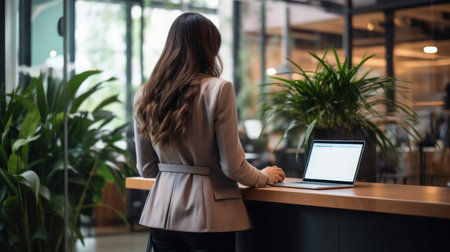 Businesswoman with laptopの素材