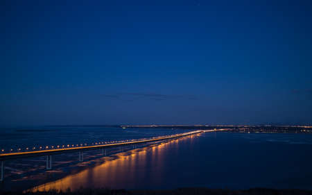 The bridge across the Volga at nightの写真素材