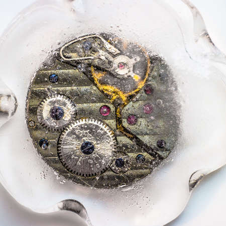 clockwork frozen in iceの写真素材