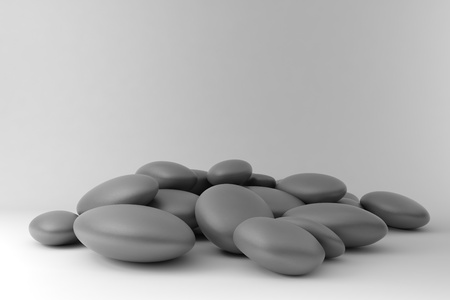 zen stones disordered on black and white backgroundの写真素材