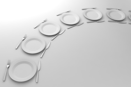 Fork, Knife and plate aligned on white backgroundの写真素材