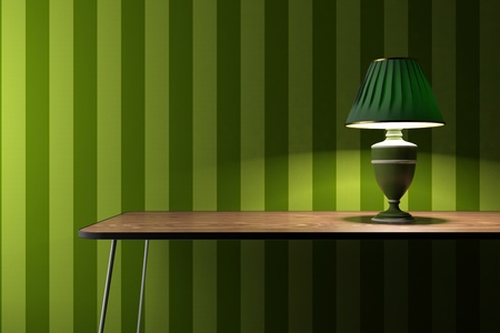 vintage lamp on a desk with green wallpaper on backgroundの写真素材