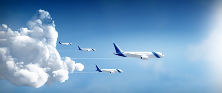 Aircrafts travel in different destinations in widescreen side viewの写真素材
