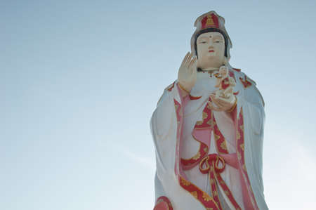 Guanyin on background  sky