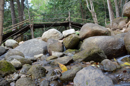 waterfall with wooden bridge Chiang Rai, Thailandの写真素材