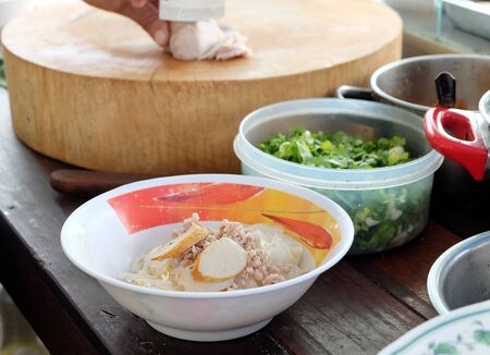 Cooking, Pork noodles with fish ball,hot and sour soup, thai foodの写真素材