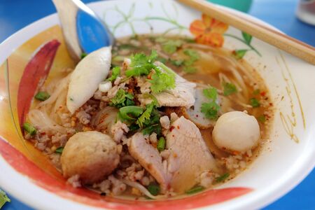 Pork noodles with fish ball,hot and sour soup, thai foodの写真素材