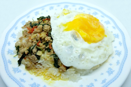Fried Rice with Basil and Fried eggの写真素材