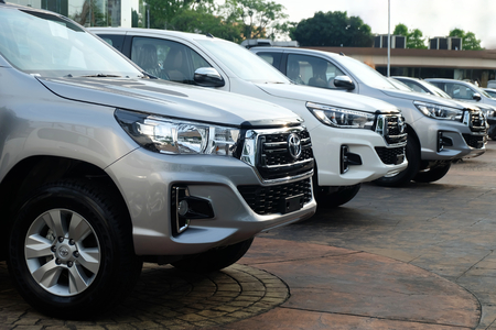 Bangkok, Thailand - May 13, 2018 Row of New Pickup Trucks For Sale, Toyota Hilux Revo 2018 at showroomのeditorial素材