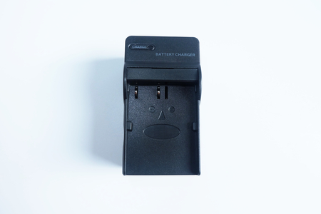 Adapter power charger battery of Camera isolated on white backgroundの写真素材