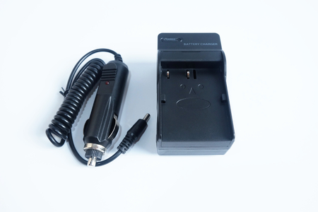 Adapter power charger battery of Camera with Car charger portable on white background.の写真素材