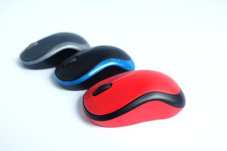 Many colorful wireless mouse isolated on white backgroundの写真素材