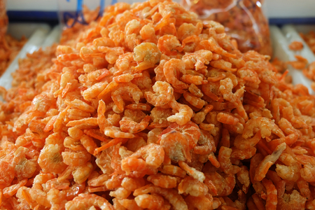 pile of dried shrimp. Seafood processing for sale at Seafood local Market in Chonburi, Thailandの写真素材