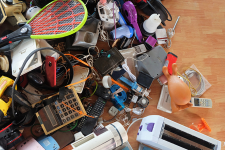 Pile of used Electronic and Housewares Waste Division broken or damage, for Reuse and Recycle