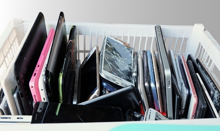 Pile of used mobile phones Waste Division broken or damage, for Reuse and Recycleの写真素材