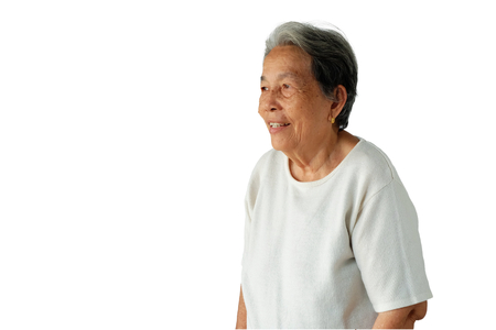 Portrait of elderly asian woman with a smile isolated on white background, happy and good health conceptの写真素材