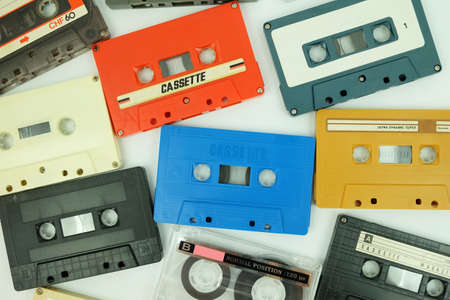 Collection of colorful old audio cassette tape isolated on a white backgroundのeditorial素材