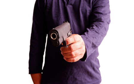 Man holding a gun in his hand and aiming Isolated on whiteの写真素材