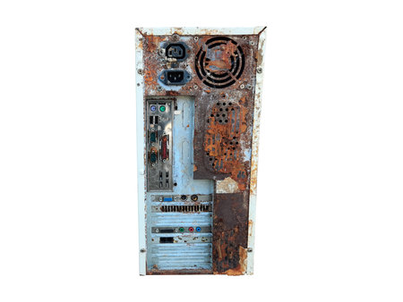 Back of old rusty computer case isolated on white background. E-waste Is an environmental problem, waste management conceptの写真素材