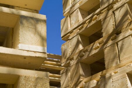 Wooden shipping pallets with sky background