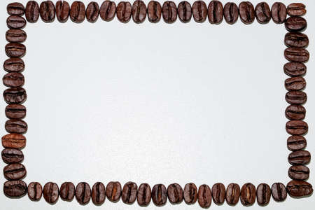 coffee in beans on a white backgroundの写真素材